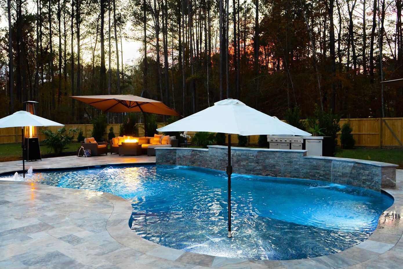 Designing gathering spaces around custom swimming pools
